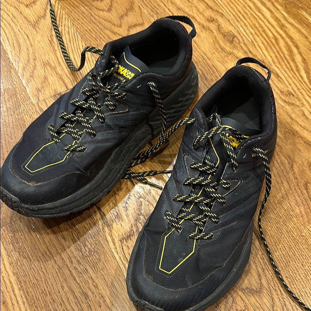 Hoka Black and Yellow Trail Shoes